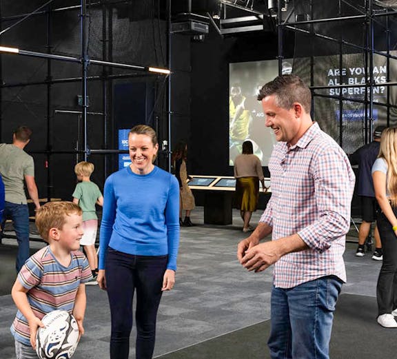 Visitors interacting at the All Blacks Experience in New Zealand.