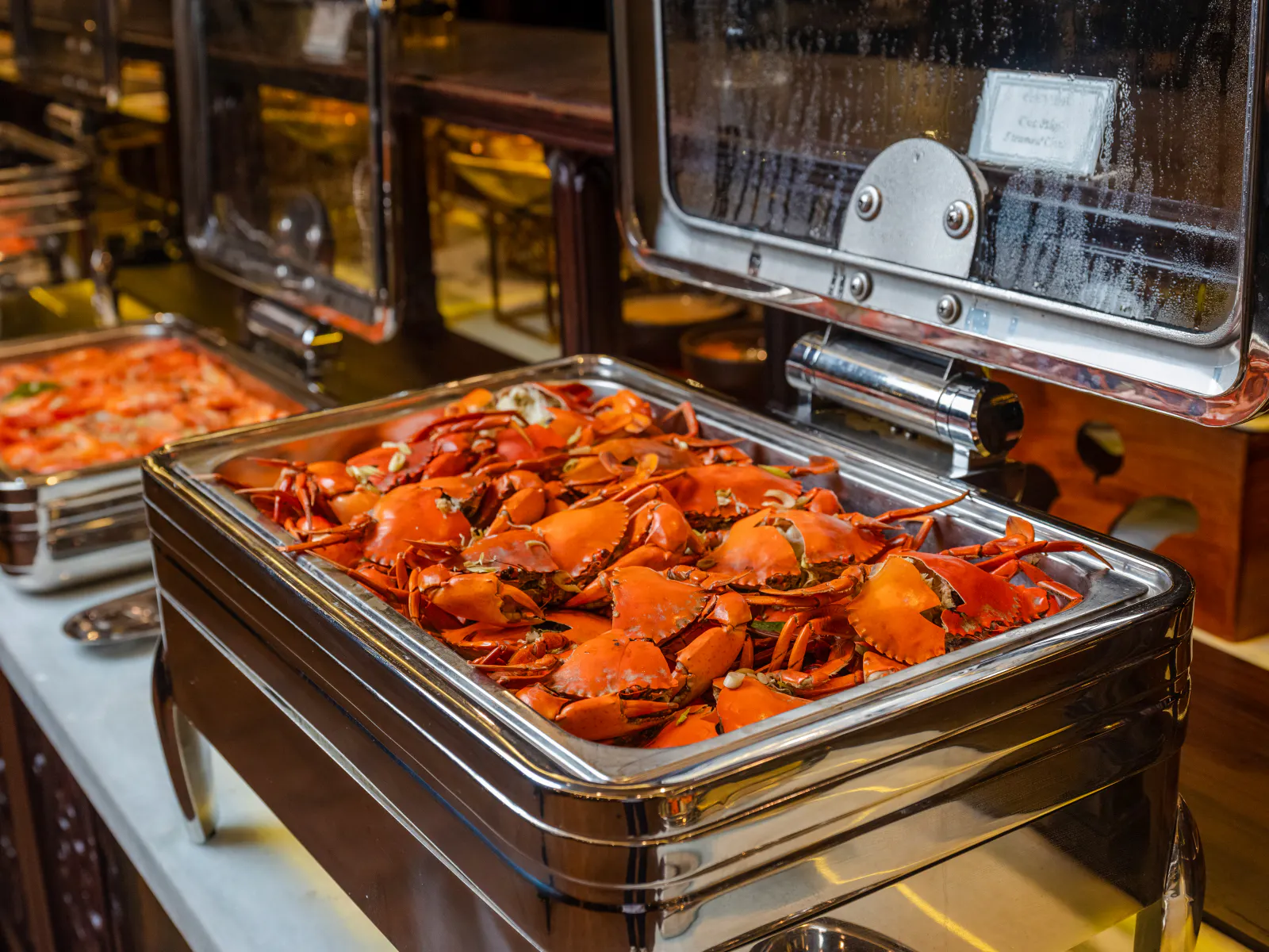 Buffet tray of cooked crabs on a cruise in Ho Chi Minh City.