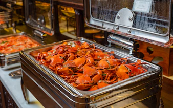 Buffet tray of cooked crabs on a cruise in Ho Chi Minh City.
