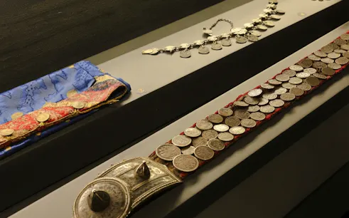 Antique coin belts and jewelry display at Museum of Numismatics, Baku.