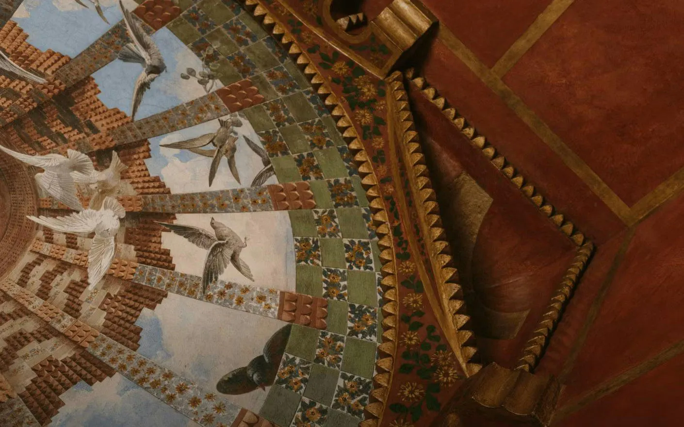 Ceiling mural with birds and geometric patterns on Casa Vicens first floor.