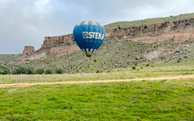 Hot air balloon over Ihlara Valley landscape, Cappadocia.