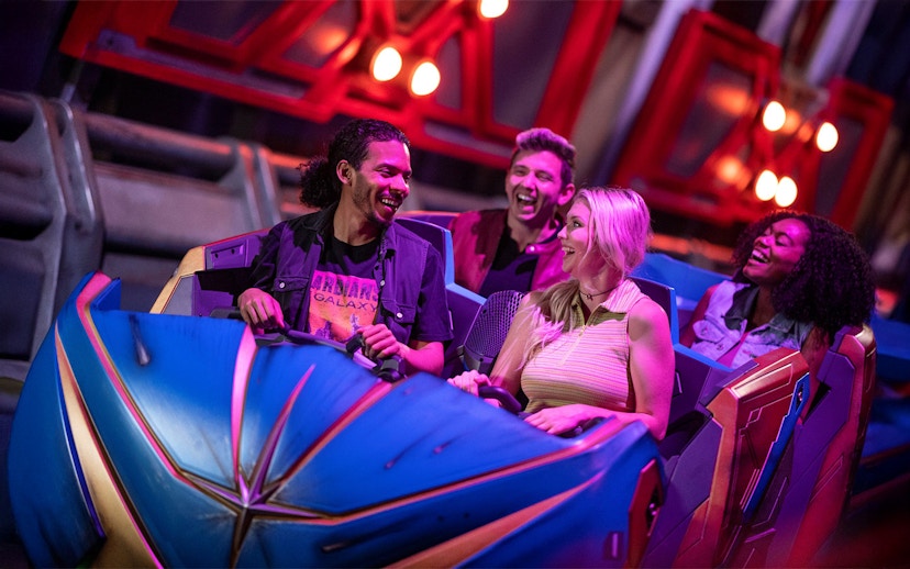 People enjoying a space-themed ride at Disney's Hollywood Studios, Walt Disney World Resort, Orlando.