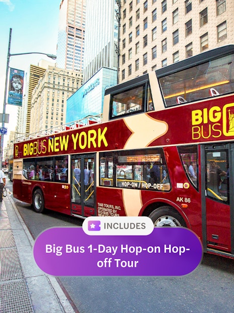 Big Bus New York tour on a busy city street with people and skyscrapers.