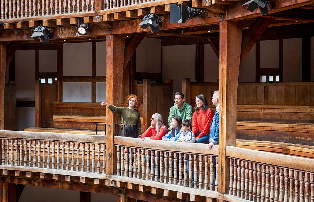 Put an interior picture of Shakespeare's Globe, which highlights proper inside architecture.