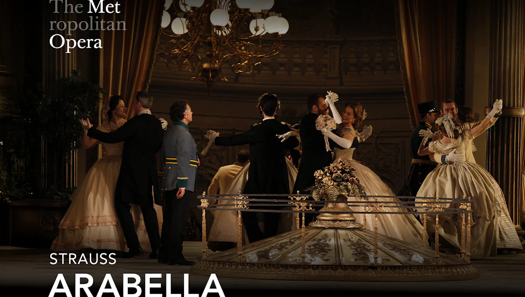 Opera performers in period costumes dancing on stage at The Metropolitan Opera's production of Arabella.