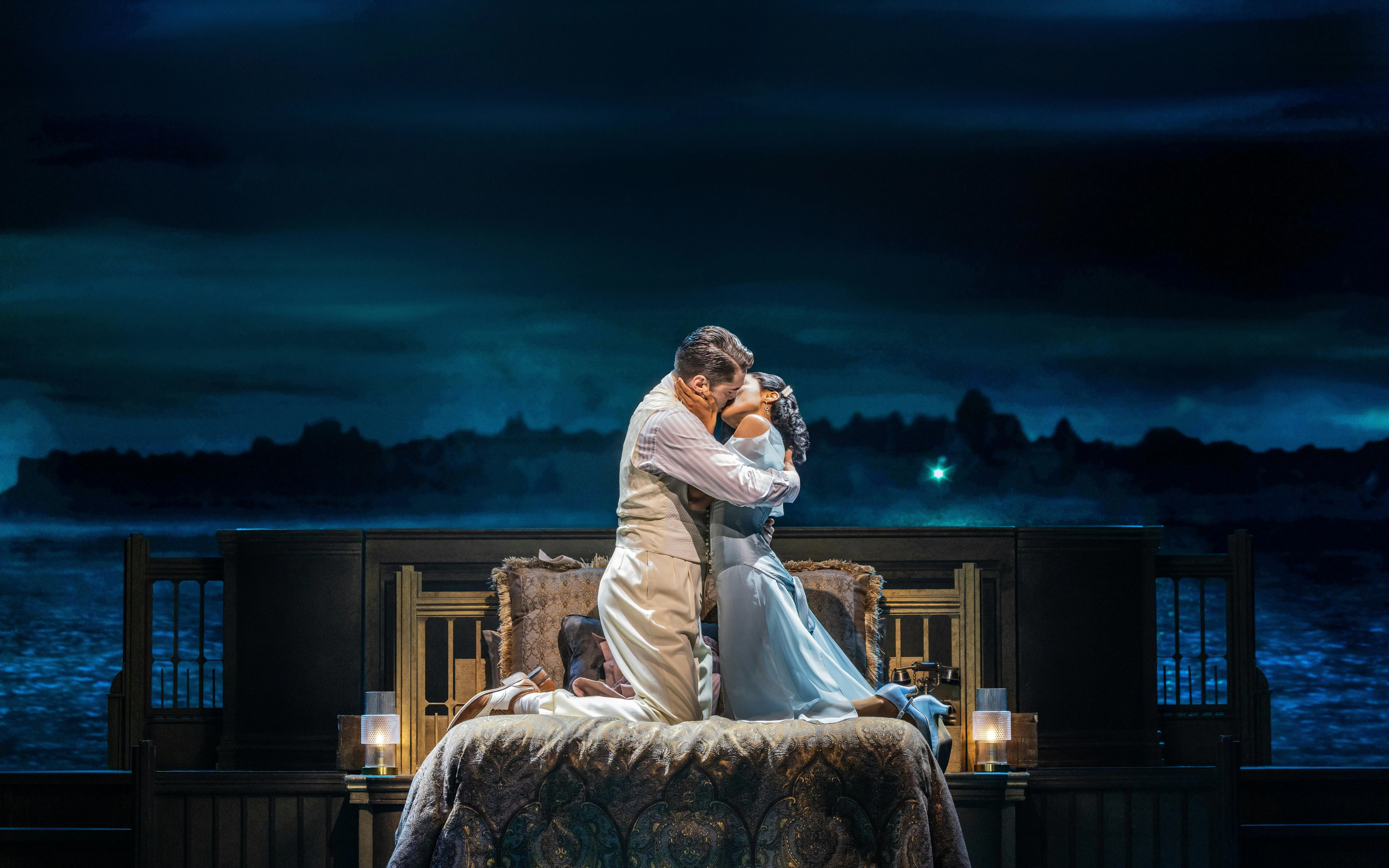 Couple embracing on stage in The Great Gatsby musical, Broadway.