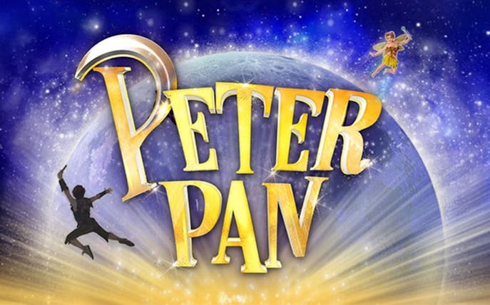Peter Pan logo with characters flying against a starry night sky.
