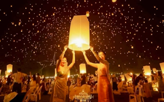 Participants releasing lanterns at Lanna Sky Lantern Festival, Nong Sariam, Chiang Mai.