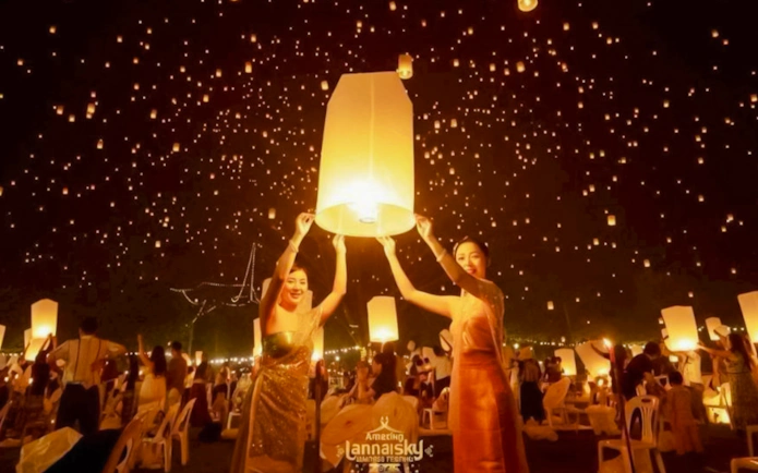 Participants releasing lanterns at Lanna Sky Lantern Festival, Nong Sariam, Chiang Mai.
