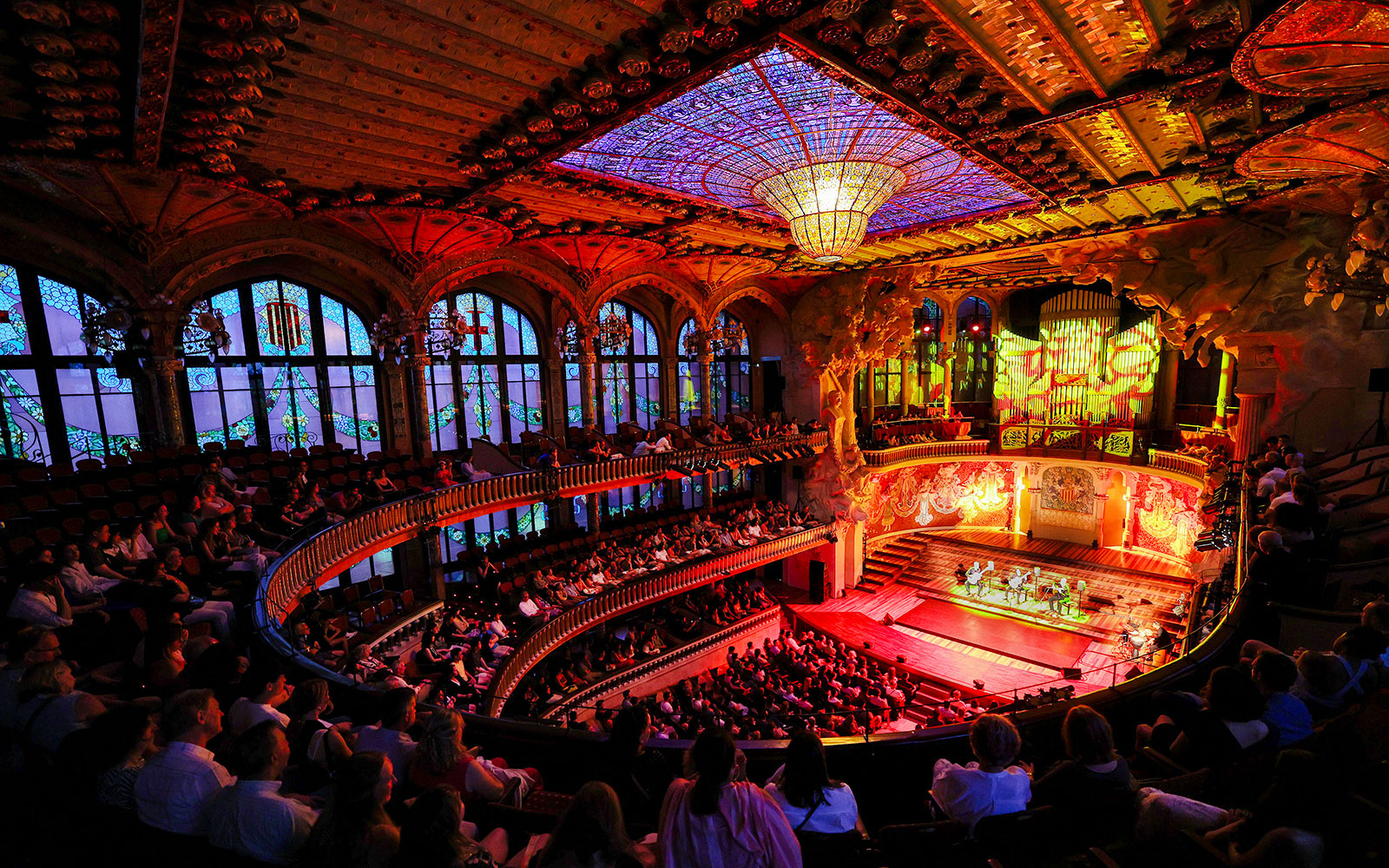 Flamenco performance on stage at Palau de la Música, Barcelona, with audience in attendance.