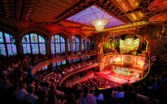 Flamenco performance on stage at Palau de la Música, Barcelona, with audience in attendance.