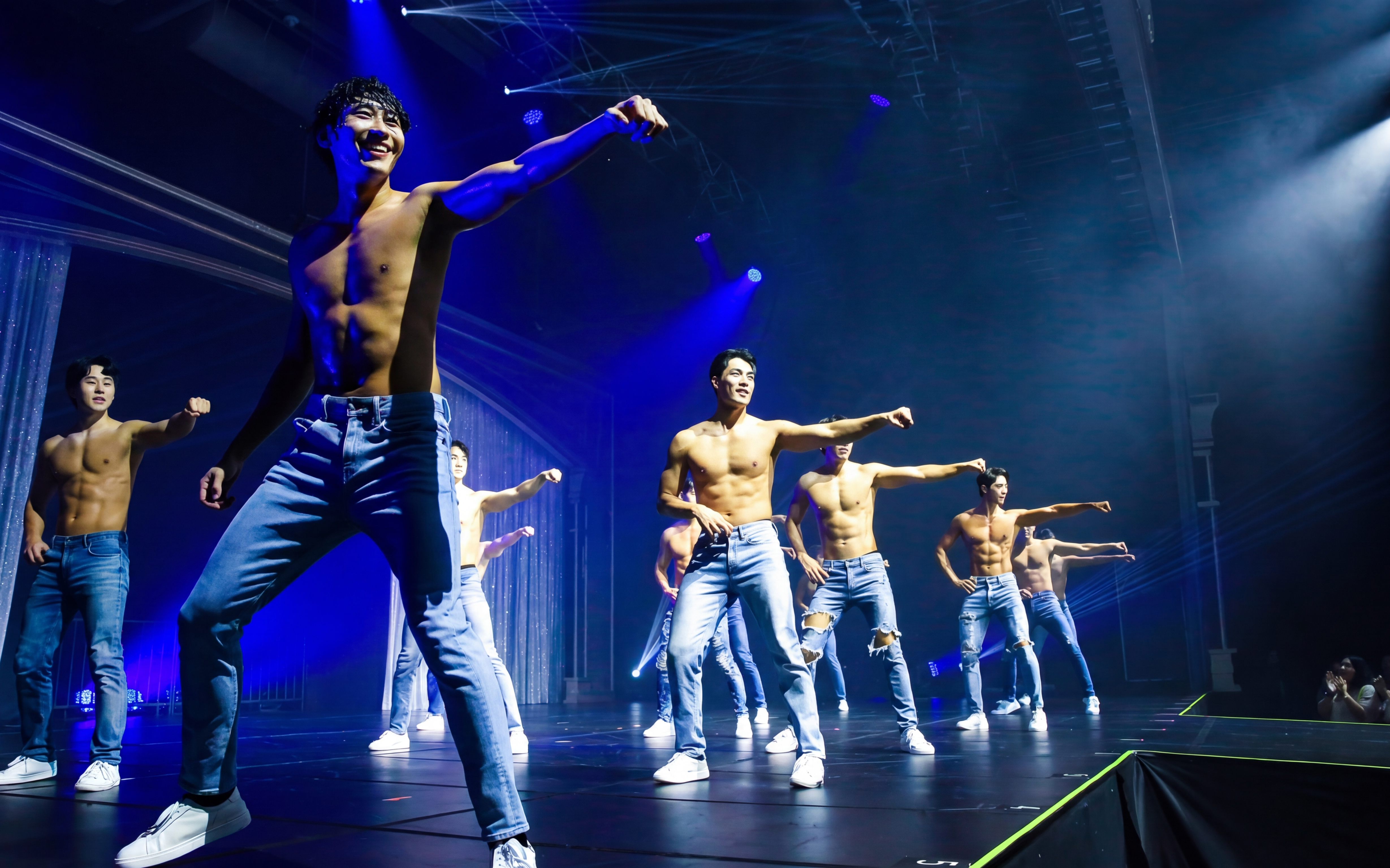 Performers dancing on stage during Wild Wild Show in Korea.