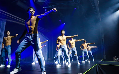 Performers dancing on stage during Wild Wild Show in Korea.