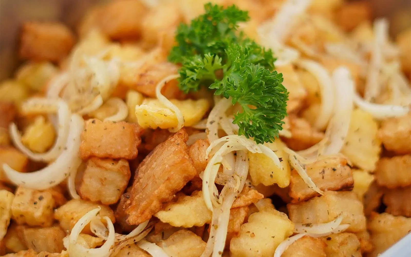 Thai fried snacks with onions and parsley served on a Riverside Carnival Cruise in Bangkok.