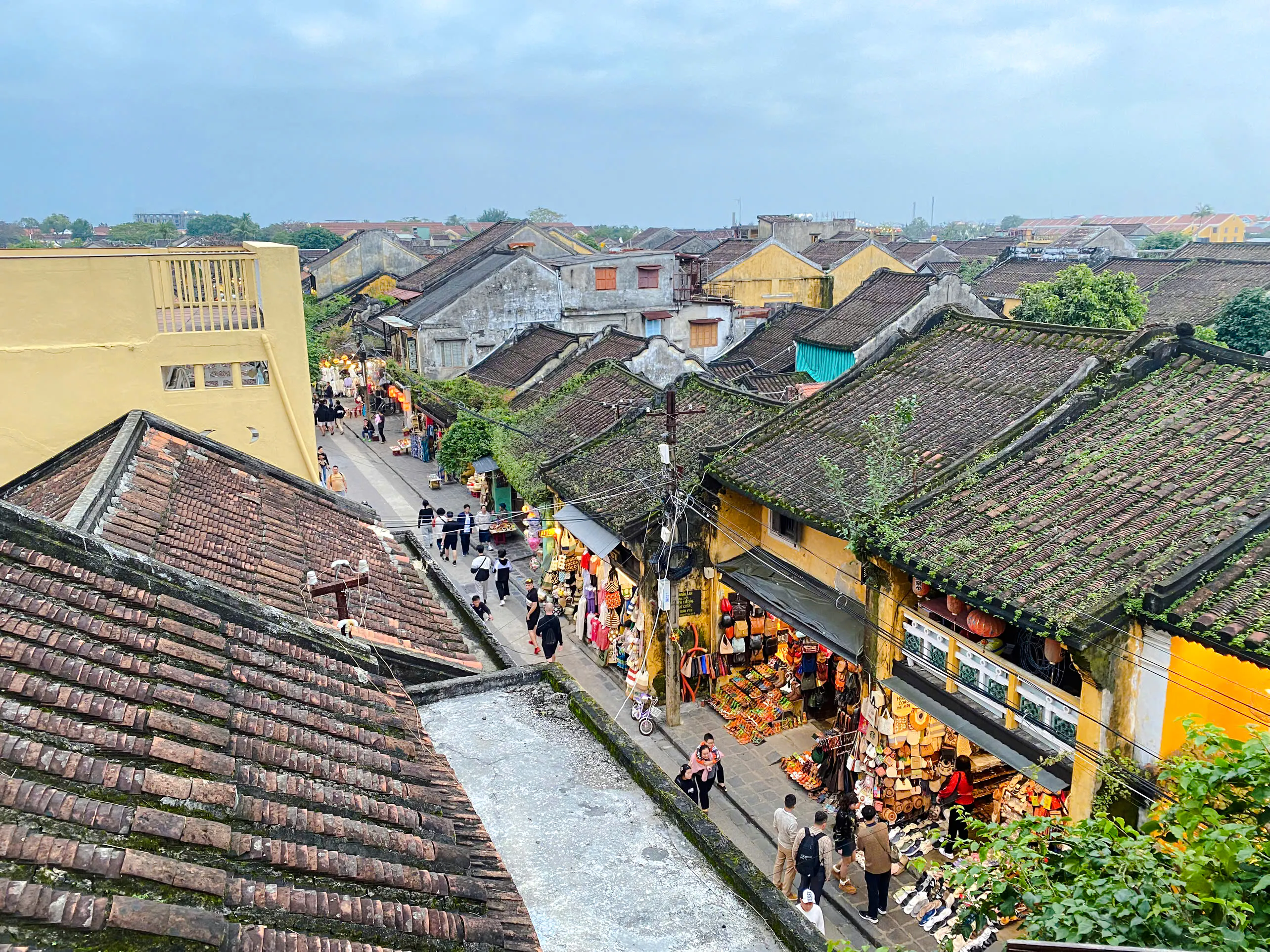Hoi An street view with traditional shops and lanterns, Da Nang.