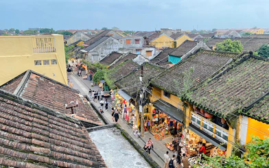 Hoi An street view with traditional shops and lanterns, Da Nang.