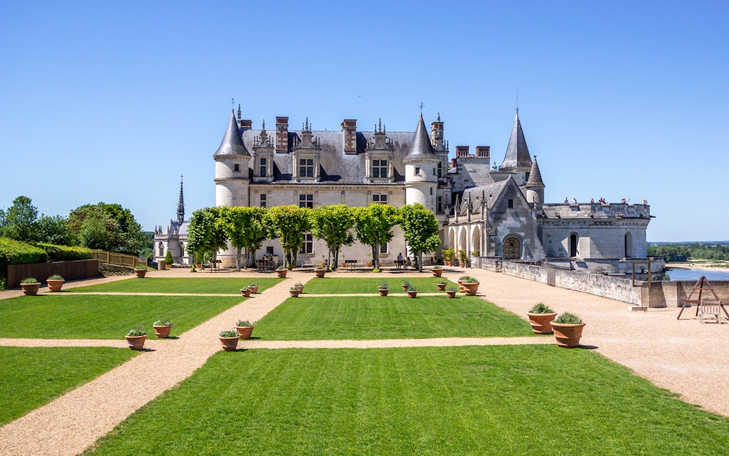 Royal Amboise Castle with manicured gardens and Loire River view.