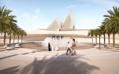 Main entrance of Zayed National Museum with fountain and palm trees, Abu Dhabi.