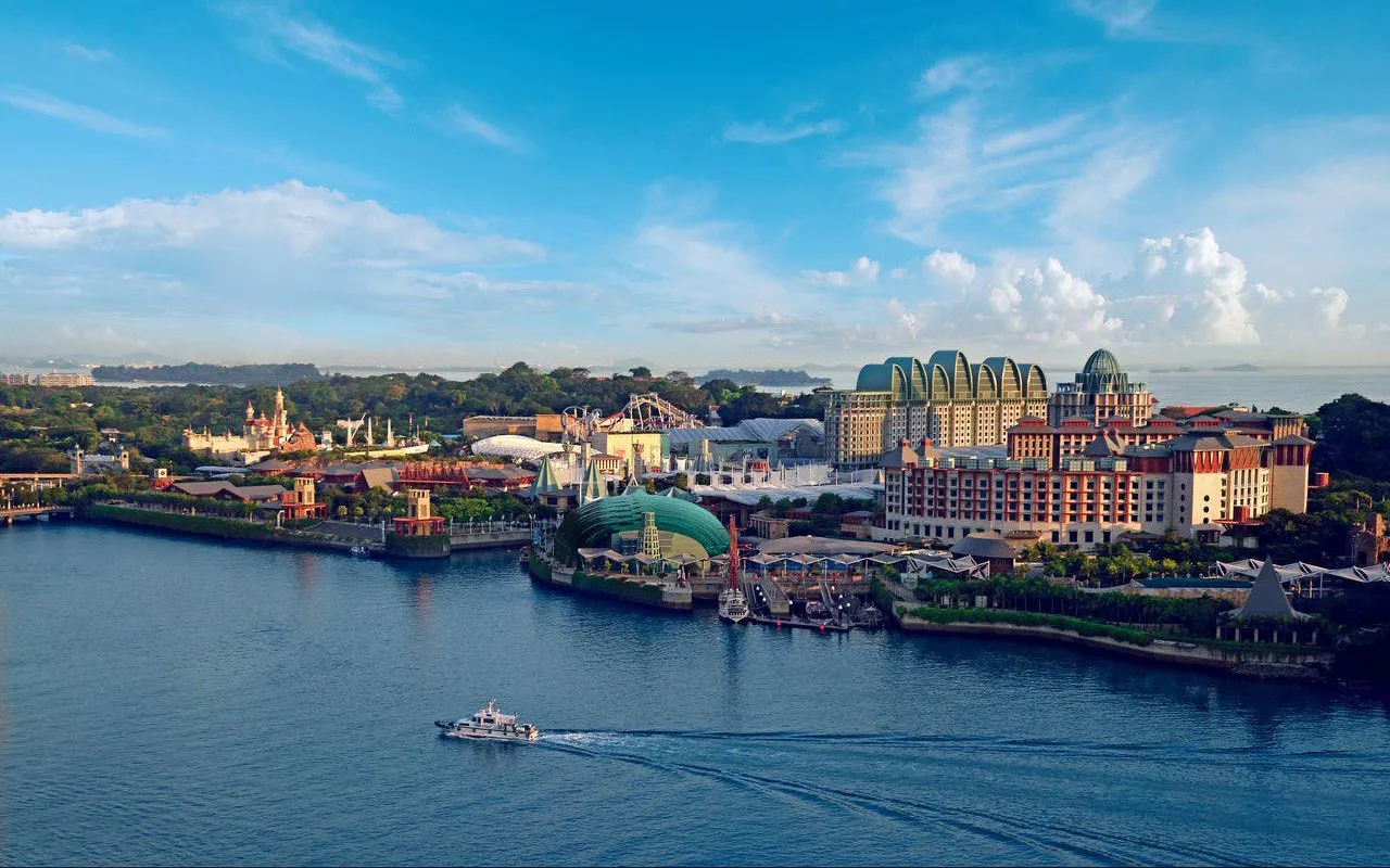Resorts World Sentosa waterfront view with hotels and attractions in Singapore.