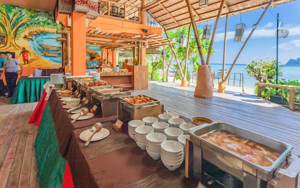 Buffet setup at beachfront restaurant on Phi Phi Island tour, Phuket.
