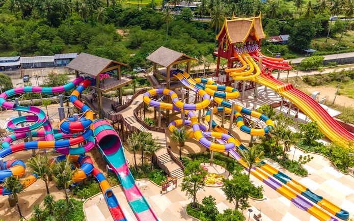 Aerial view of colorful water slides at Andamanda Phuket water park.