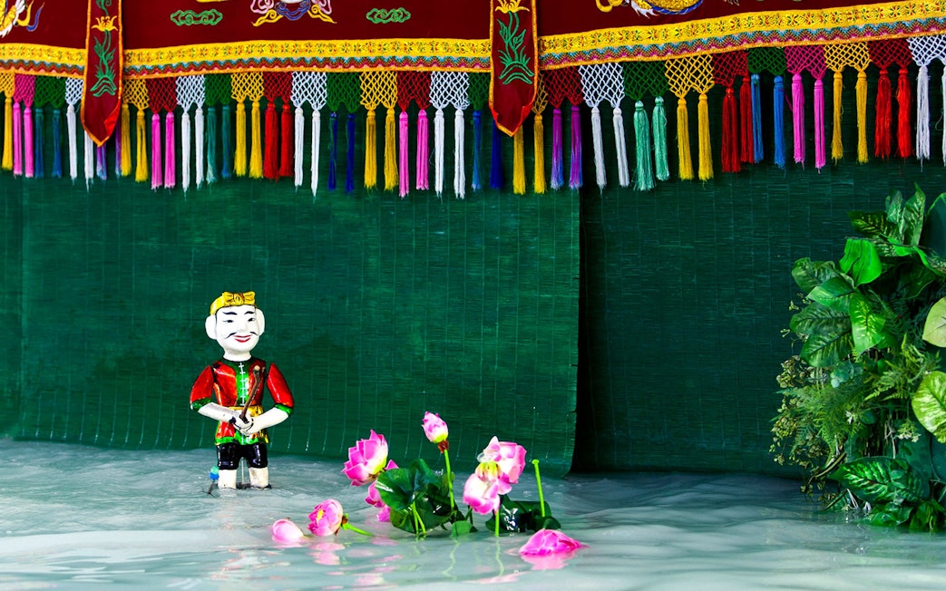 Water puppet on stage at Golden Water Puppet Show, Vietnam.