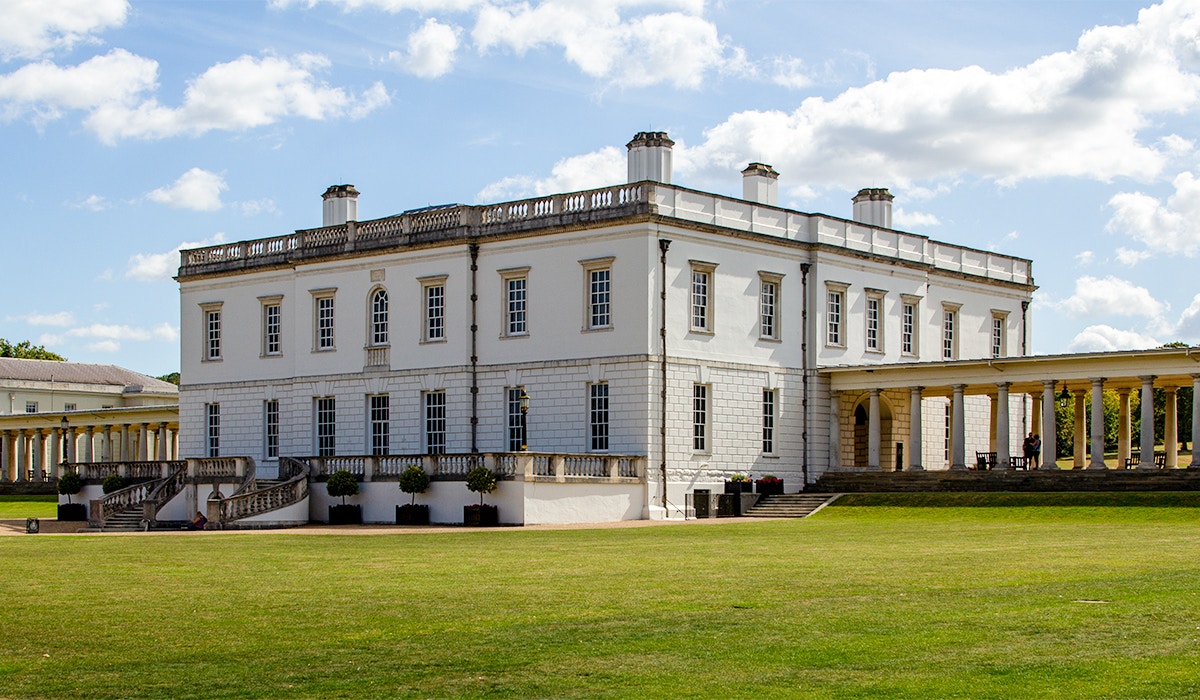 Queen's House Museum in Greenwich with classical architecture and surrounding lawn.