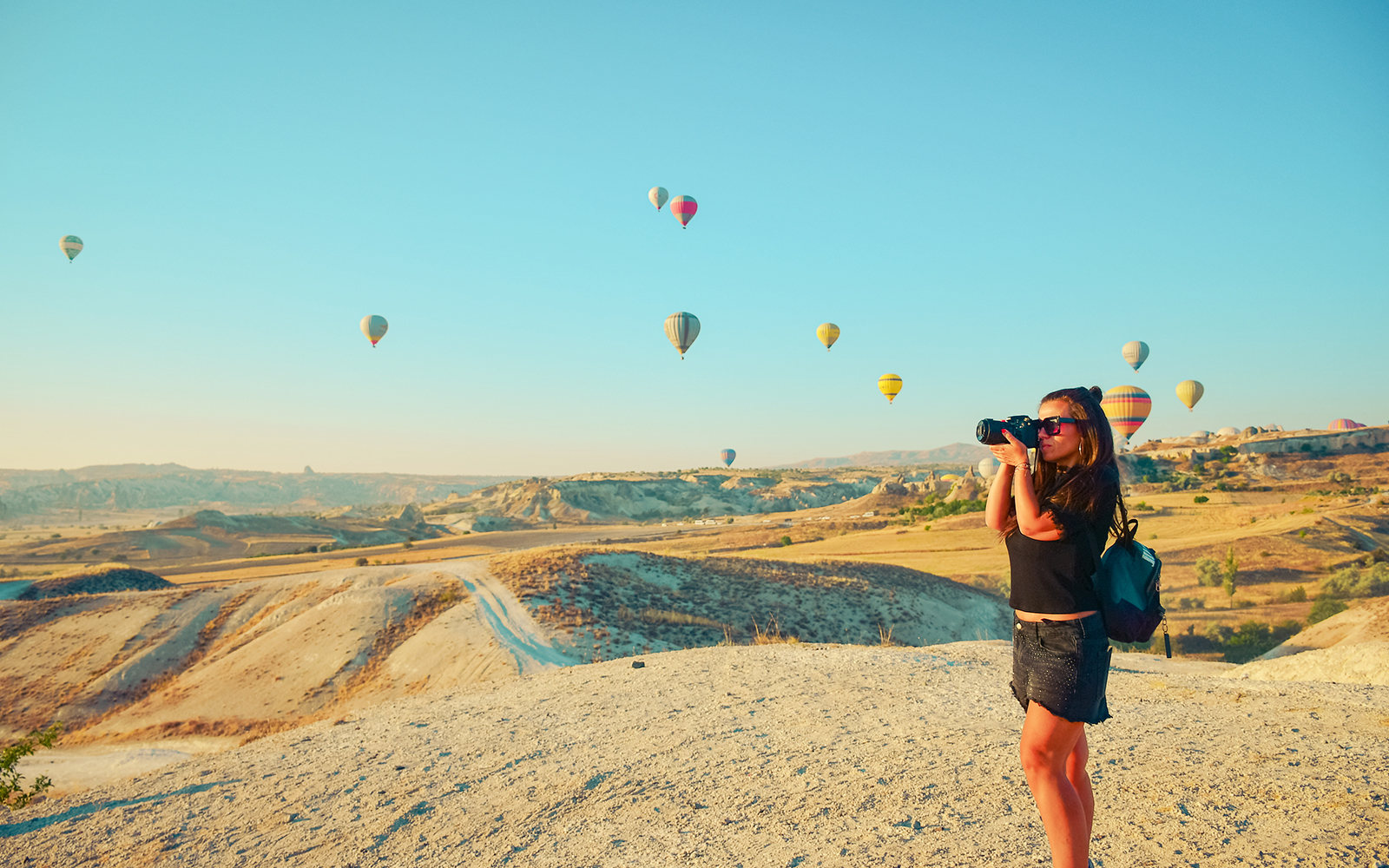Tips - This is a Photograph of Girl using camera