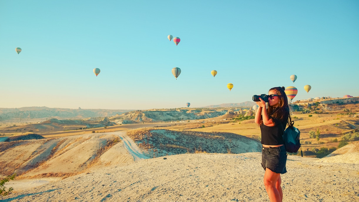 Tips - This is a Photograph of Girl using camera