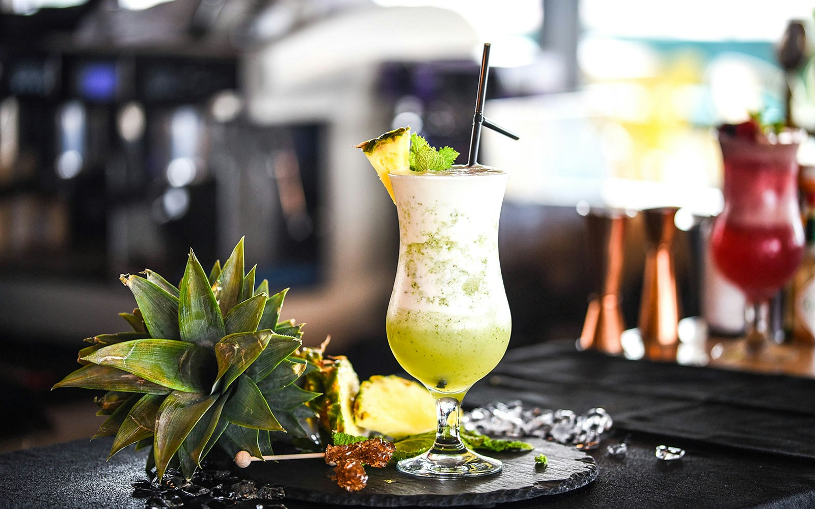 Mocktail served at Burj Khalifa Level 124-125 with city view in background, Dubai.