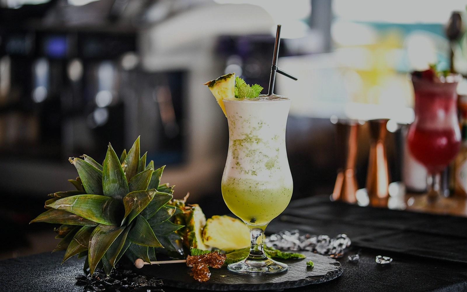 Mocktail with pineapple garnish at Burj Khalifa At the Top, Levels 124-125.