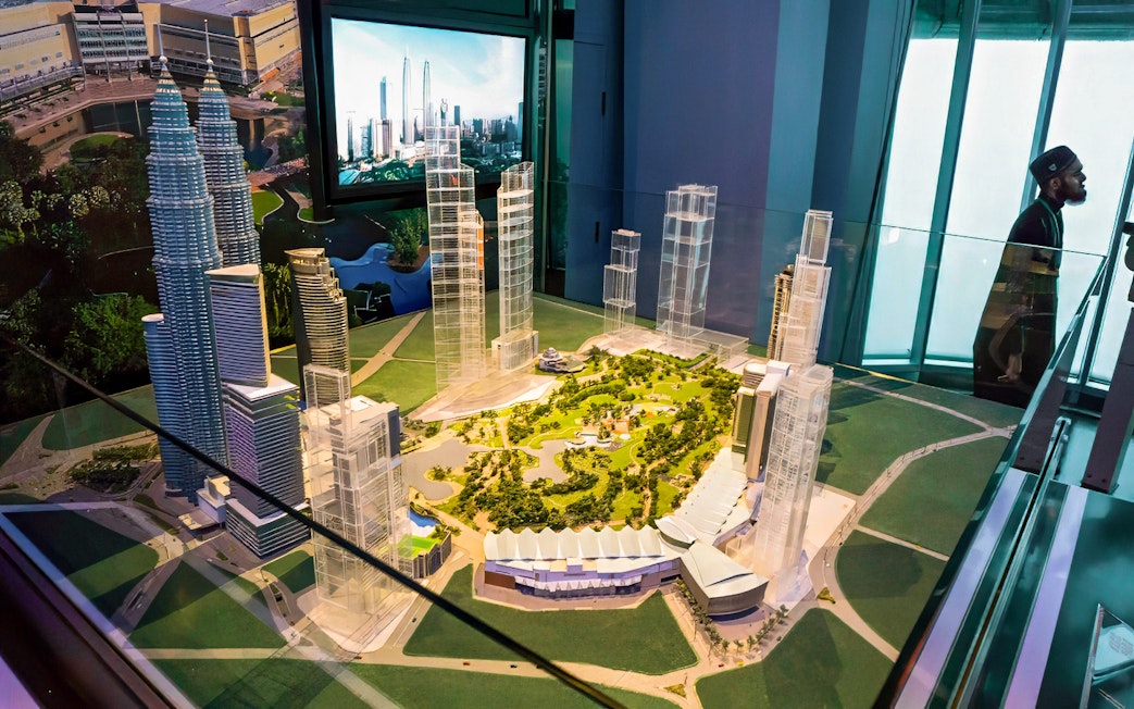 Model of Petronas Twin Towers and surrounding area in Kuala Lumpur exhibit.
