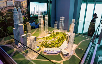 Model of Petronas Twin Towers and surrounding area in Kuala Lumpur exhibit.