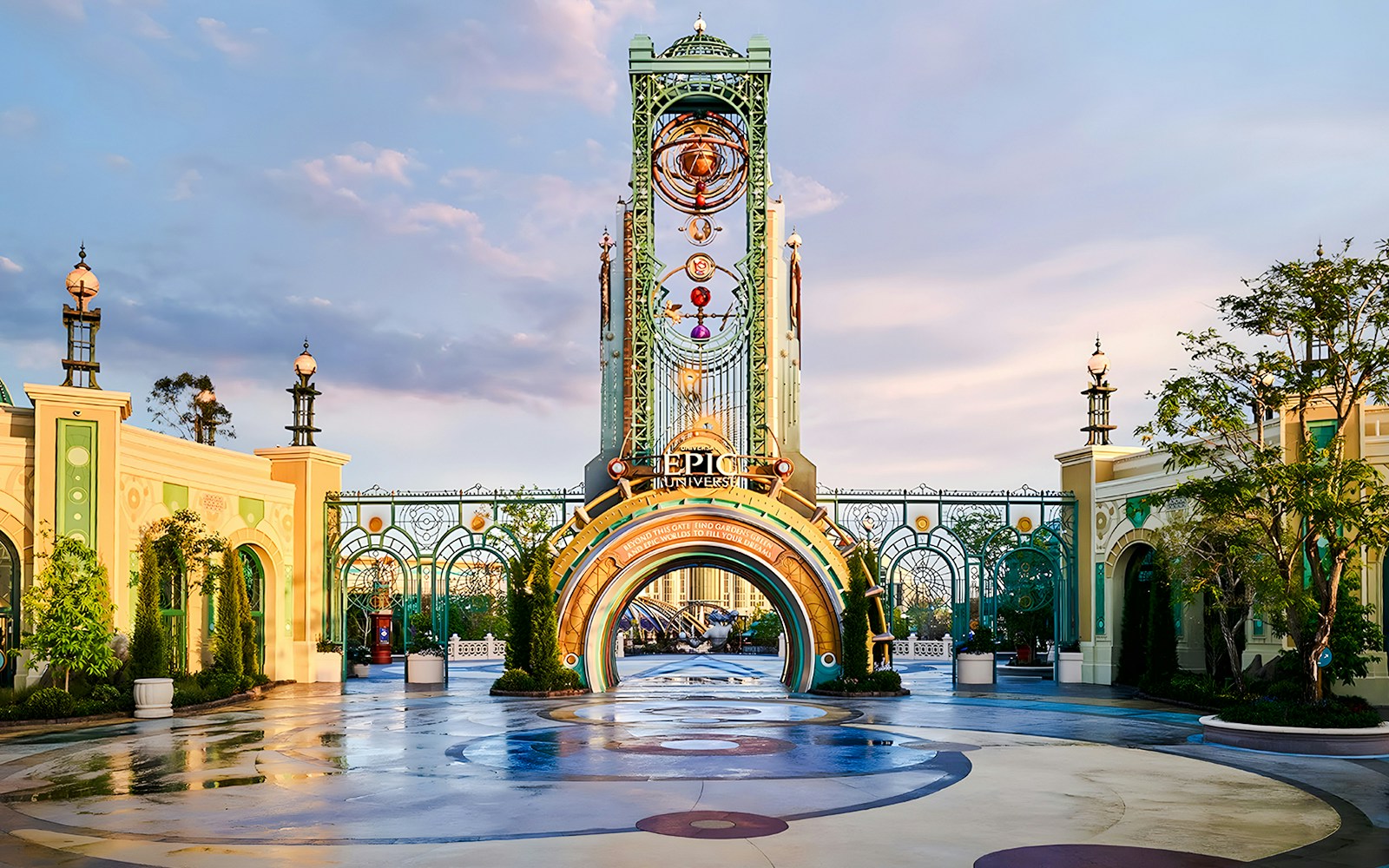 Entrance to Universal Epic Universe theme park with ornate archway and decorative elements.