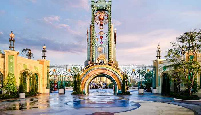 Entrance to Universal Epic Universe theme park with ornate archway and decorative elements.