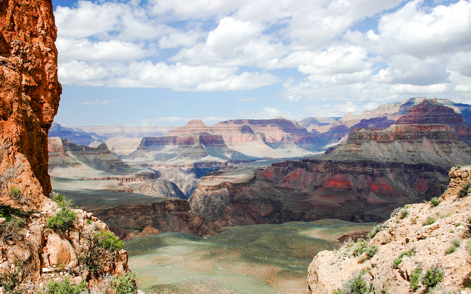 Grand Canyon view with layered rock formations on a Hummer tour.