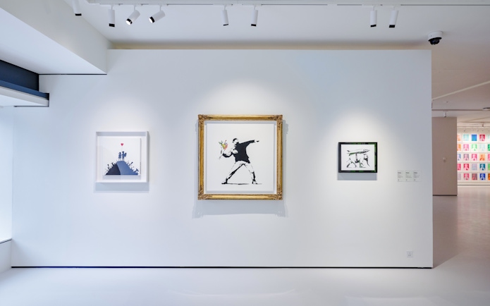 Banksy artworks displayed at Moco Museum London exhibition.