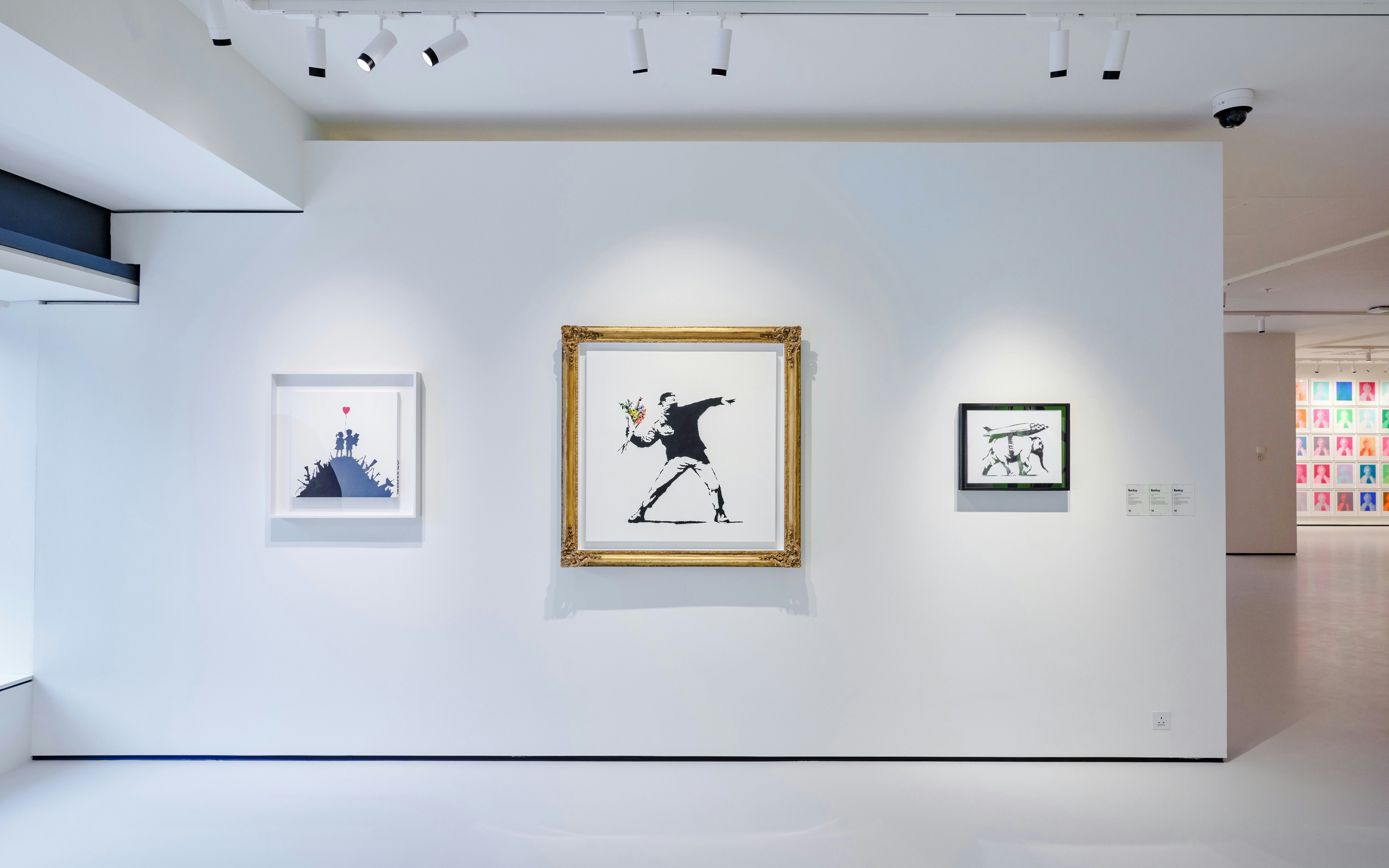 Banksy artworks displayed at Moco Museum London exhibition.