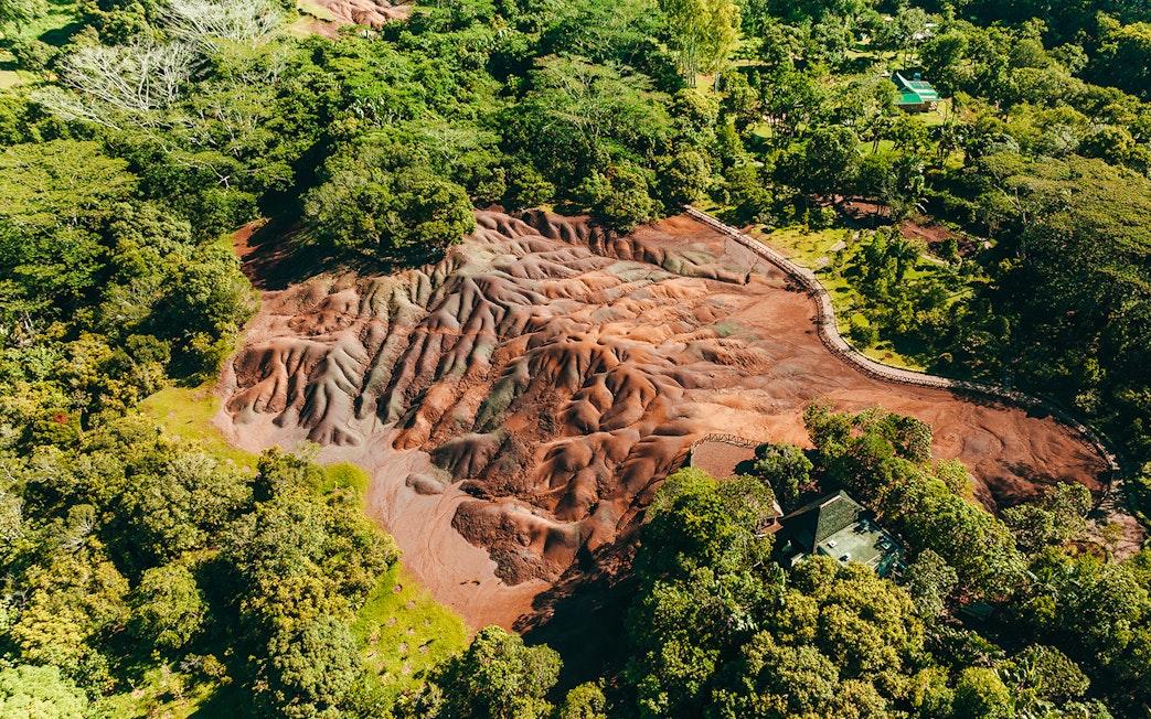 Chamarel 7 Coloured Earth geological formation surrounded by lush greenery in Mauritius.