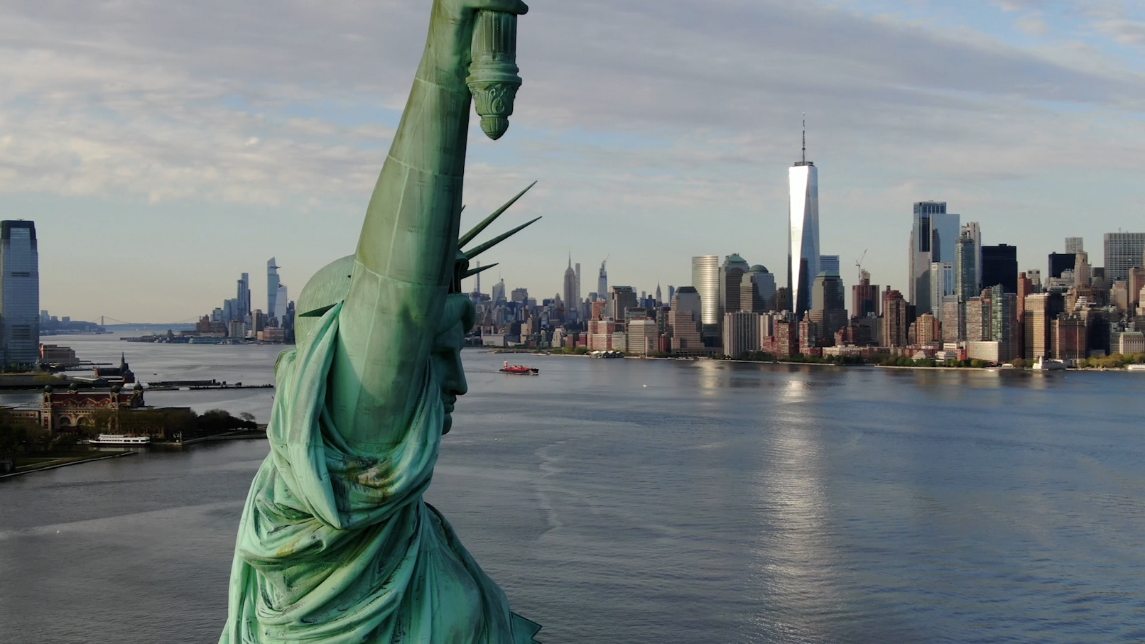 Gondola gliding through Venice City canal with historic buildings in view.