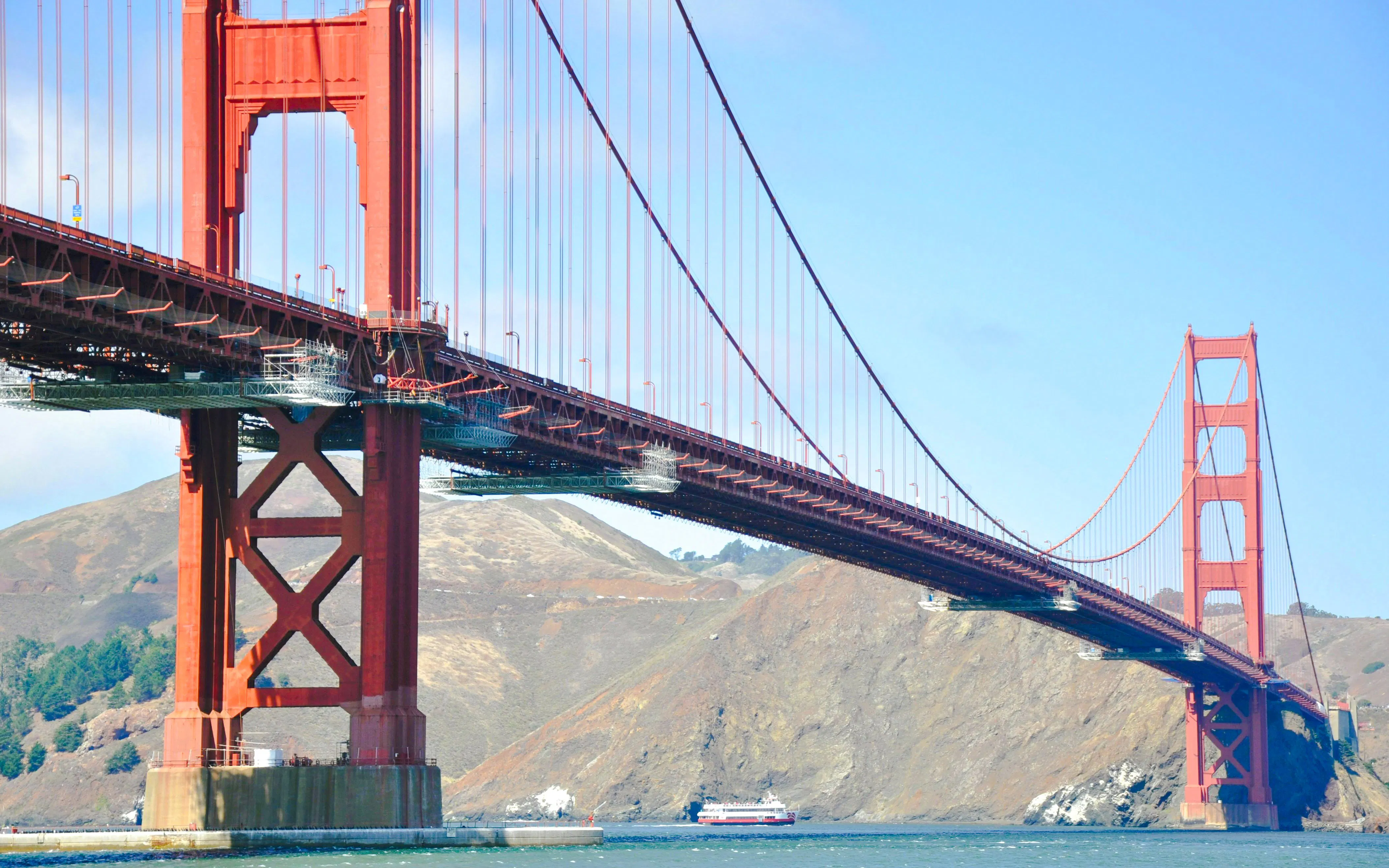 Golden Gate Bridge with cruise ship in San Francisco Bay.