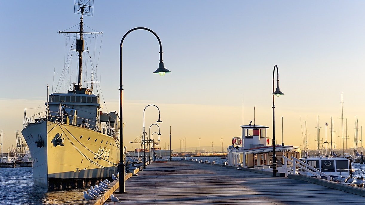 Ferry approaching Gem Pier at Williamstown with Melbourne skyline in the background.