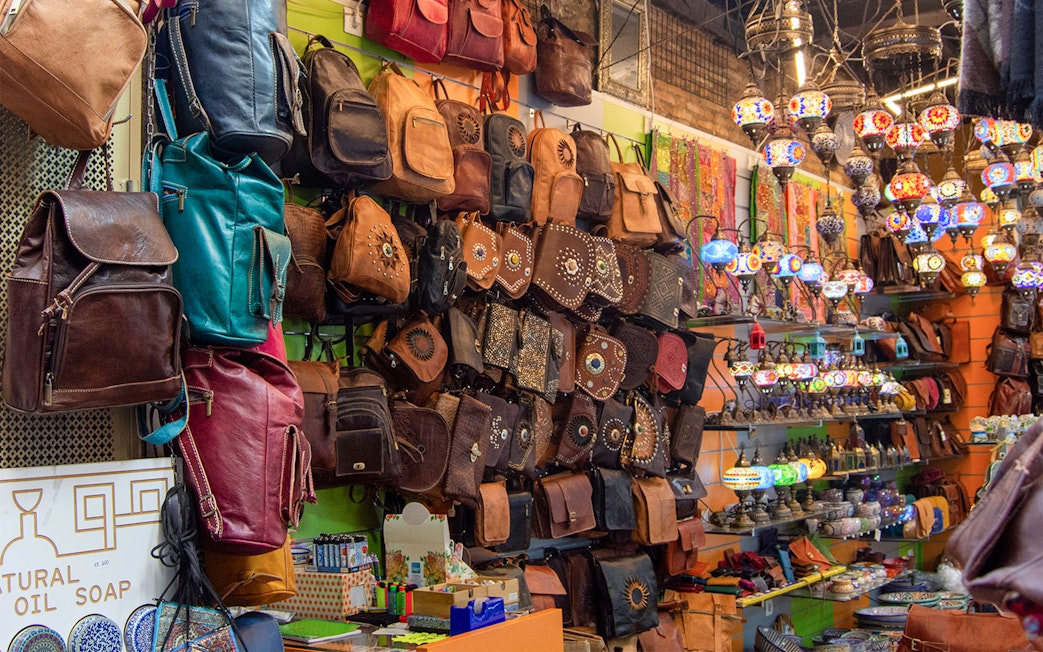 Leather bags and colorful lamps displayed at la Alcaicería, Arabic souk of Granada.