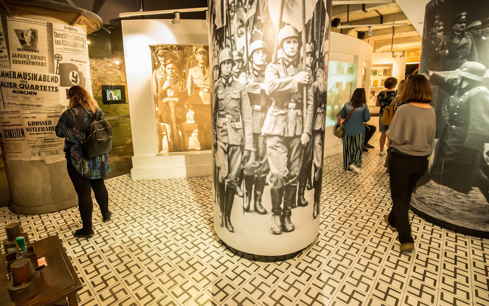 Visitors exploring Schindler's Factory Museum in Krakow's Jewish Quarter.