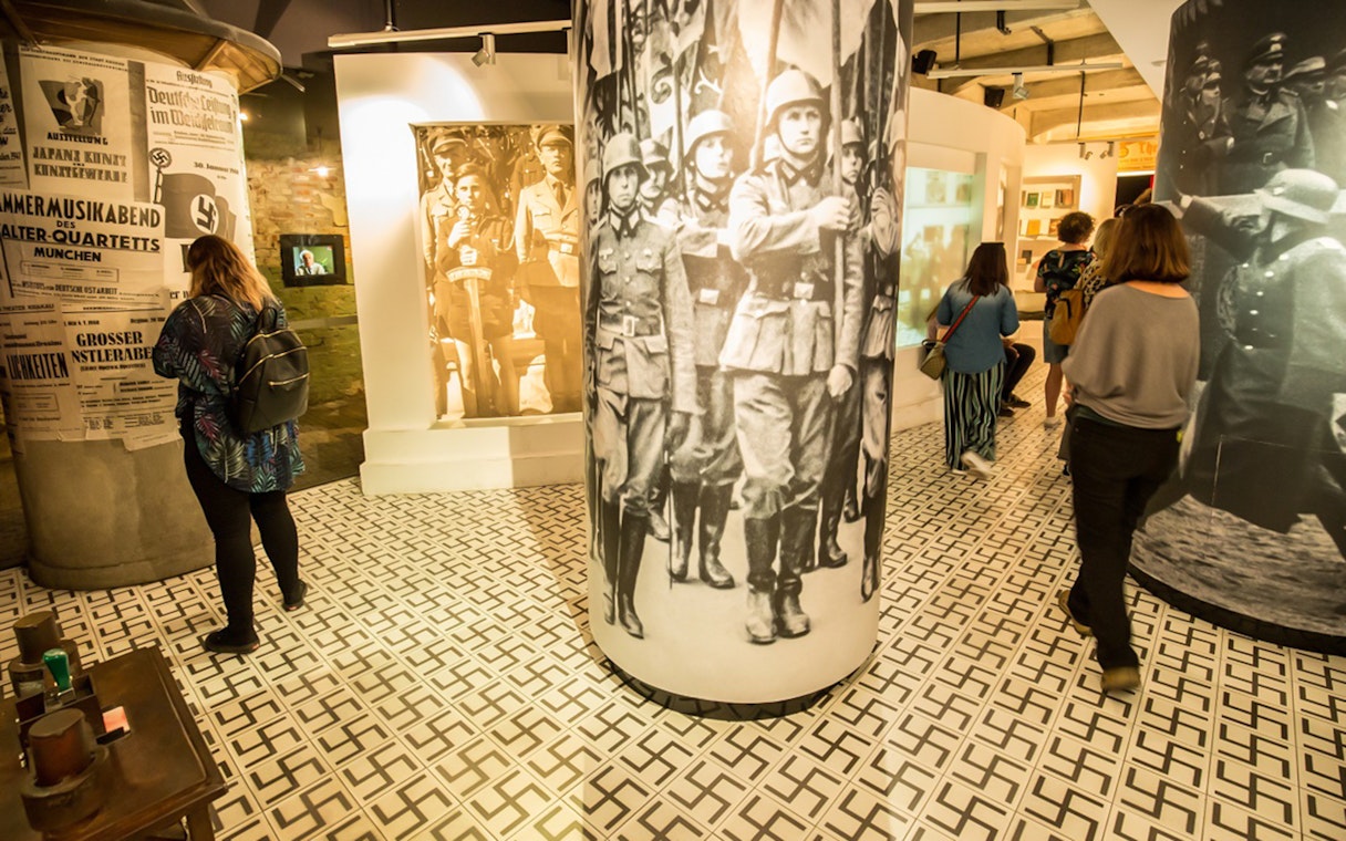 Visitors exploring Schindler's Factory Museum in Krakow's Jewish Quarter.