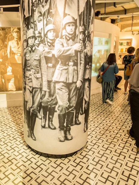 Visitors exploring Schindler's Factory Museum in Krakow's Jewish Quarter.