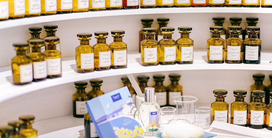 Perfume bottles displayed at Mini Perfume Workshop in Grasse.