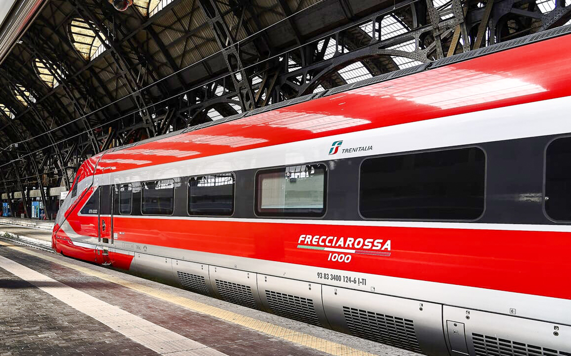Frecciarossa high-speed train at station, Bologna to Modena route.