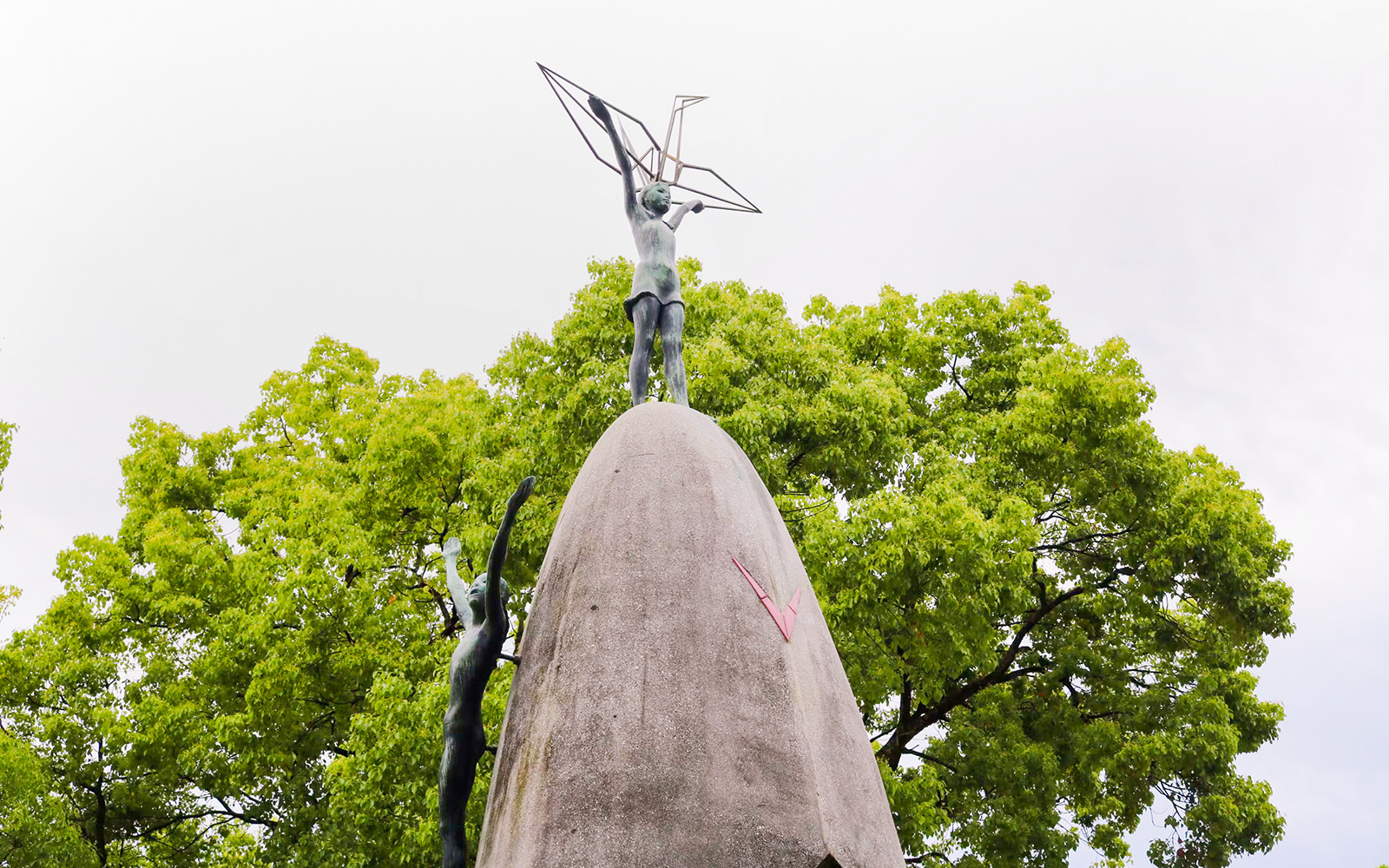 Children's Peace Monument with origami crane in Hiroshima's Peace Memorial Park.